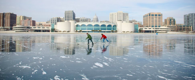 Residents of Madison, Wisconsin, play ice hockey on the frozen Lake Monona.